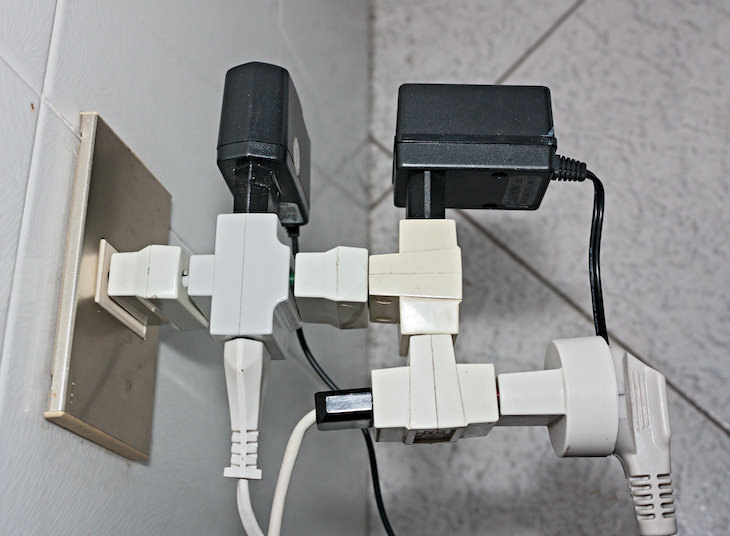 NEVER Do These 7 Things When Using a Power Strip, a few power strips plugged into one another
