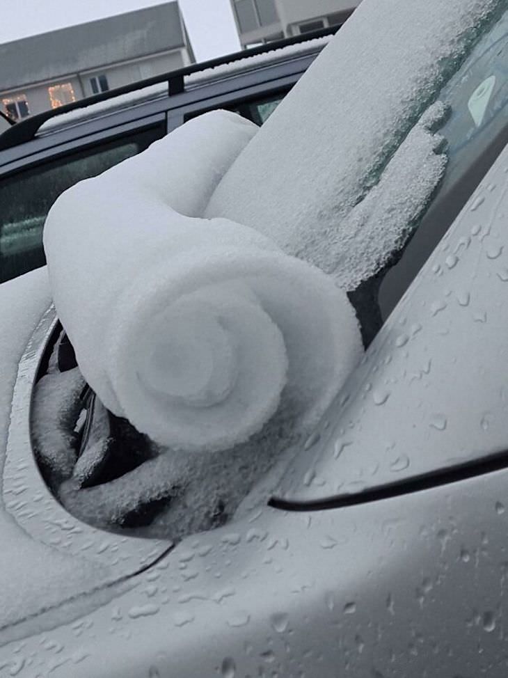 Stunning Accidental Snow Sculptures, The way the snow rolled down on my windshield