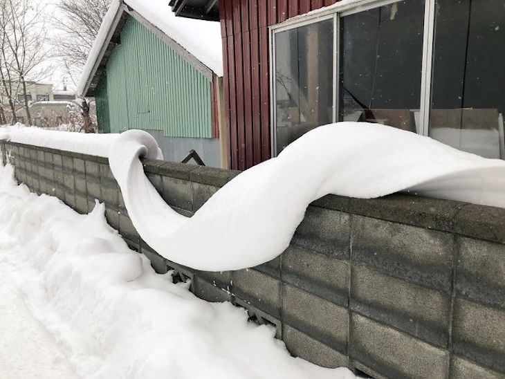 Stunning Accidental Snow Sculptures, A Perfectly melted ribbon of snow