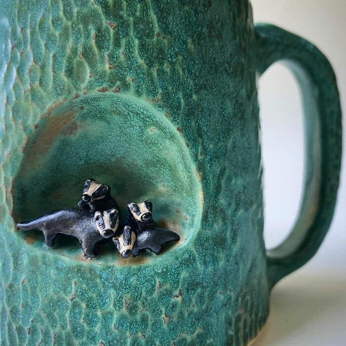 cute animal sculpture cups  skunks