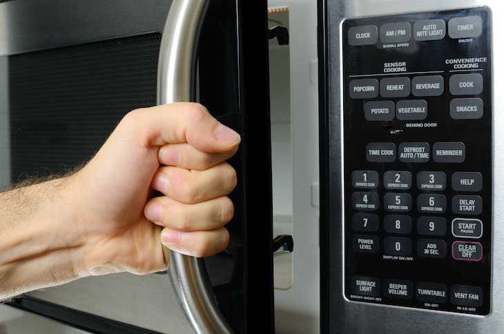  Habits That Shorten Your Microwave’s Lifespan, slamming microwave door