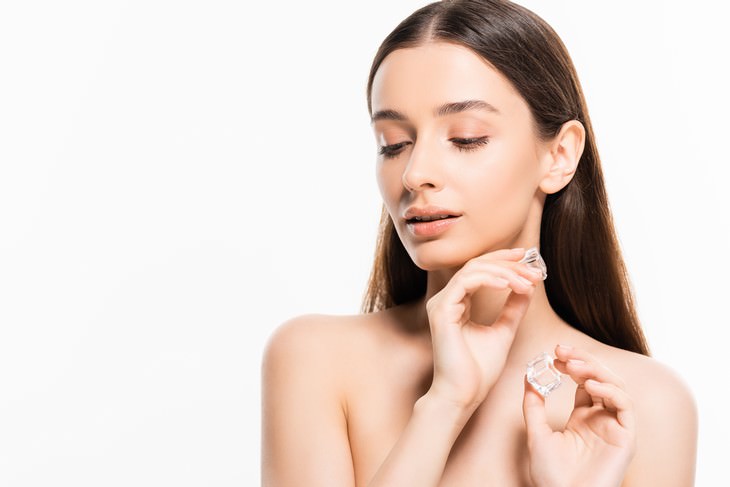 effective vintage beauty tips model holding ice cubes