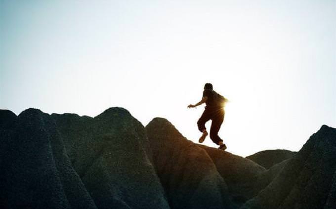 Man climbing on rocks