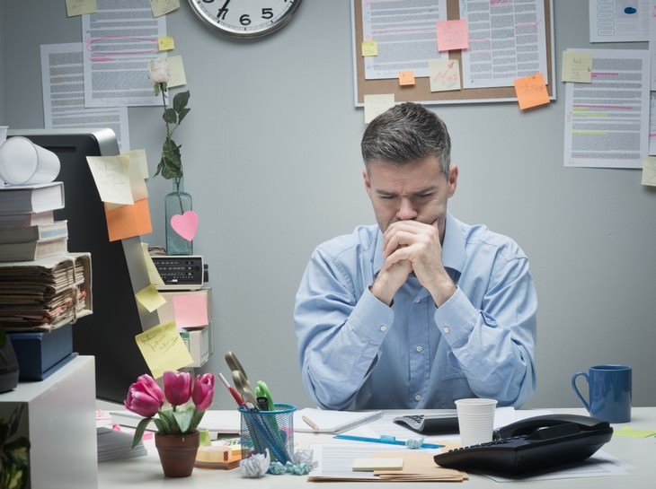 signs stress is harming your health angy man in an office