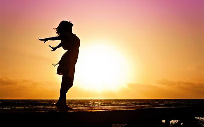 woman happy in sunset