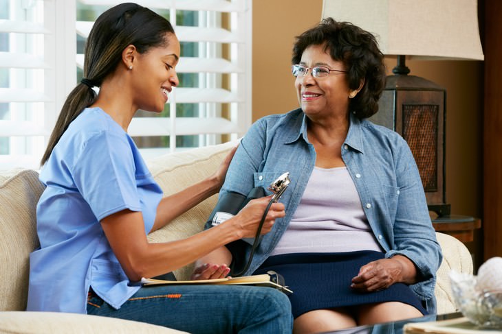 Health Benefits of Rosemary nurse measuring woman's blood pressure