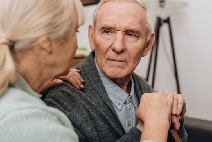seniors health mistakes sad man and woman supporting him