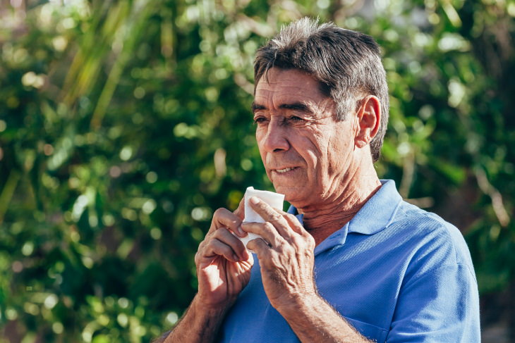 Peppermint Health Benefits man after blowing his nose outside