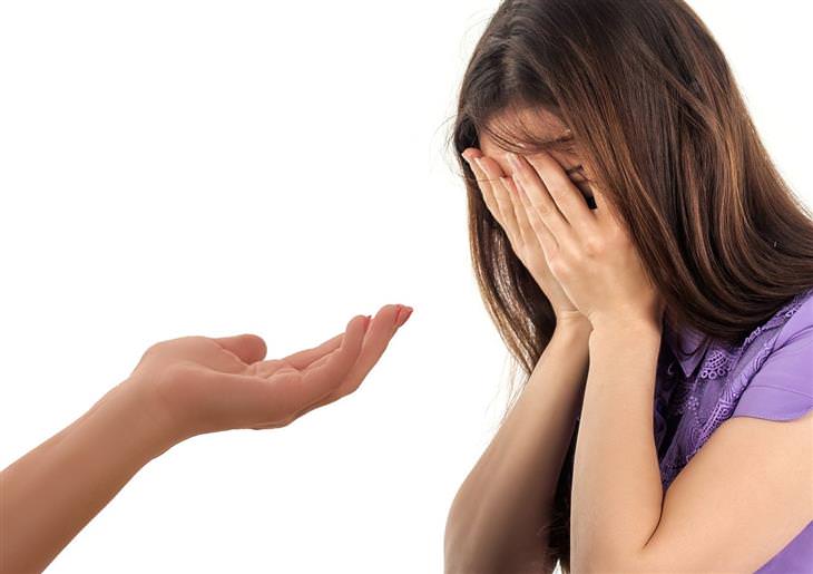 woman crying and a helping hand