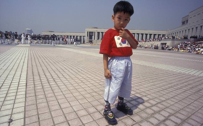 korean boy at korean war monument