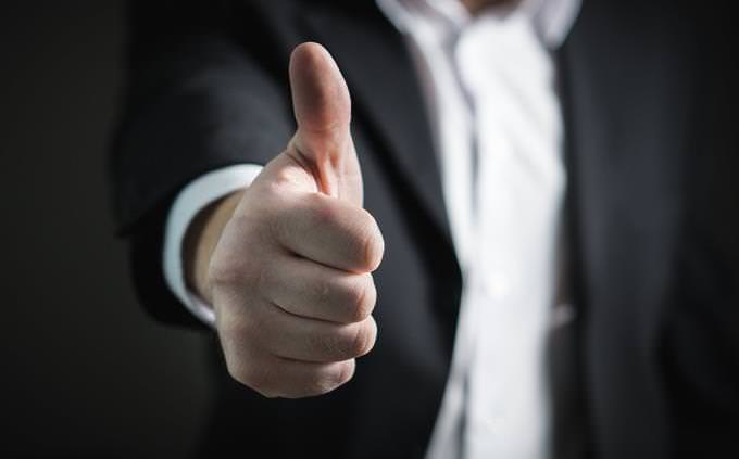 thumbs up from a guy in a suit