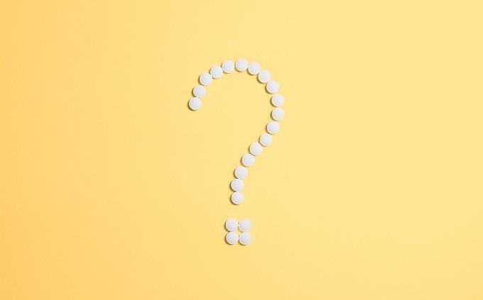 question mark in white on yellow background
