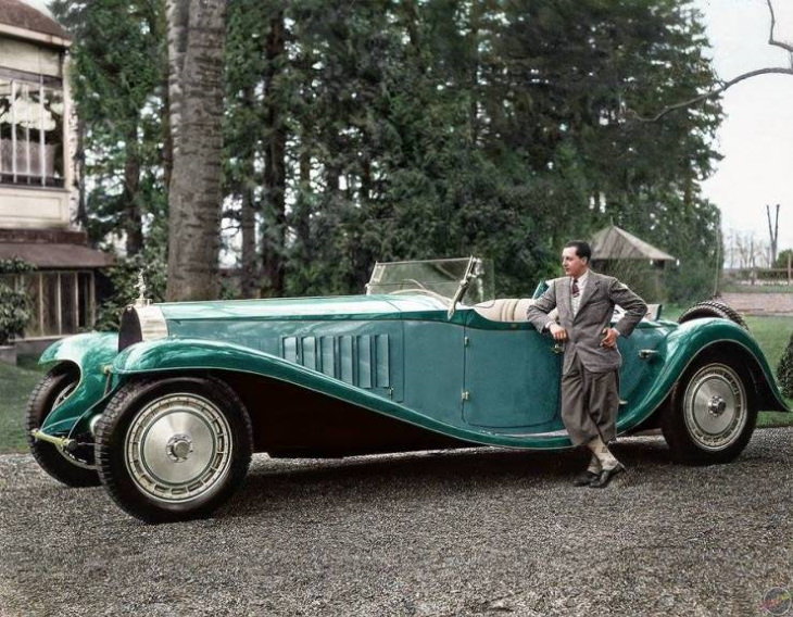human scale photos Jean Bugatti standing next to his Bugatti Royale, one of seven built (1932).