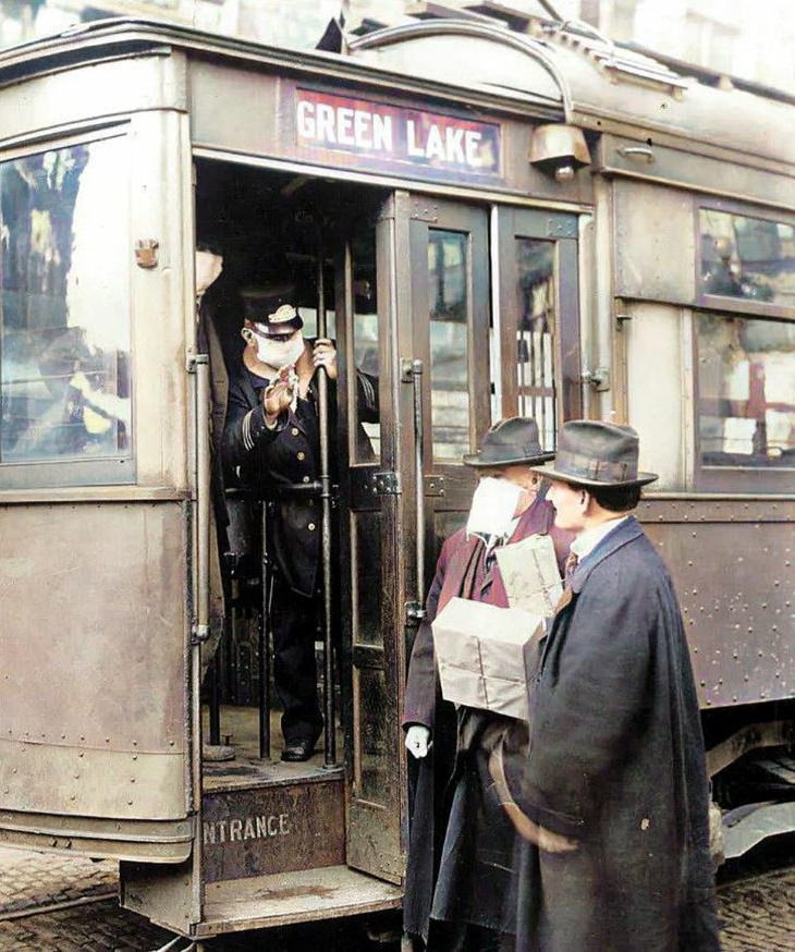Photos From the Spanish Flu A bus conductor refusing entrance to an unmasked man in Seattle, USA