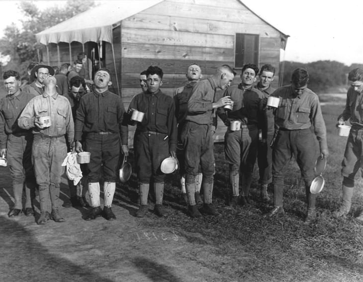 Photos From the Spanish Flu men in Camp Dix, New Jersey gargling with saltwater