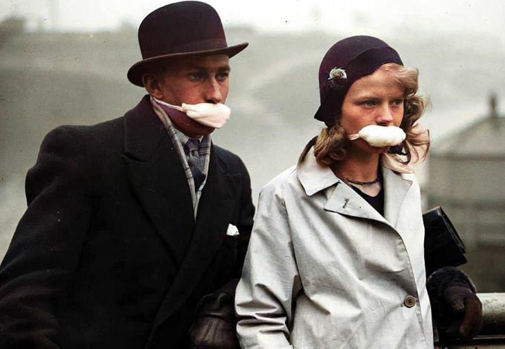 Photos From the Spanish Flu A couple on the streets in London in 1919