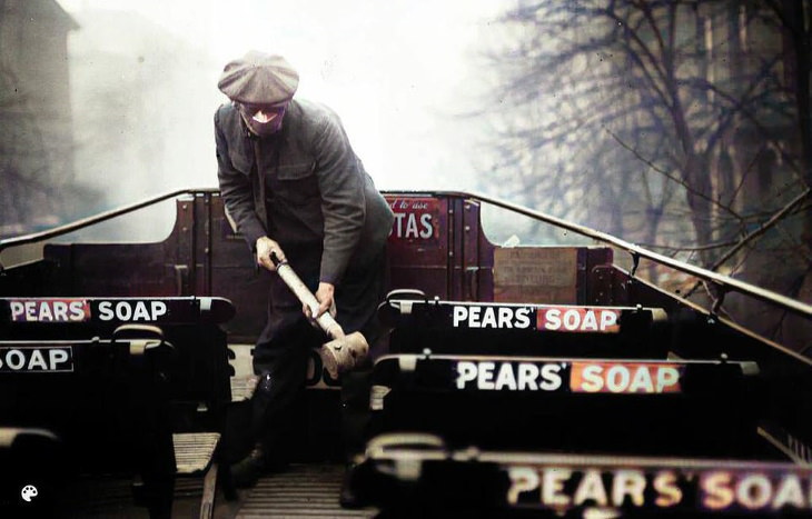 Photos From the Spanish Flu masked cleaners sprayed public transportation in London in 1920