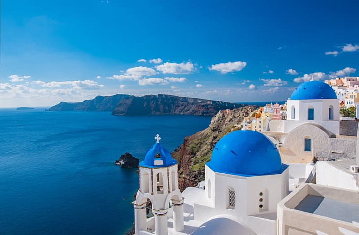  Travel Destinations That Will Reopen Amid the Pandemic Santorini Greece