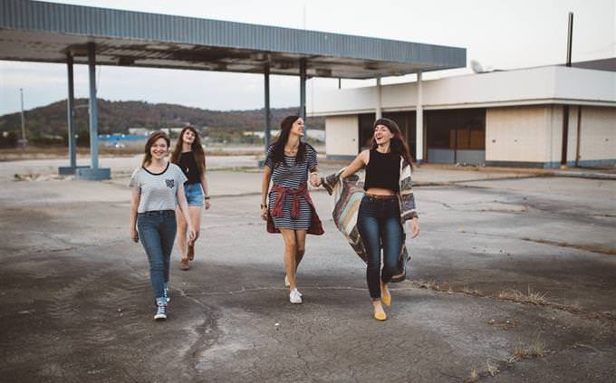 a group of women walking outside