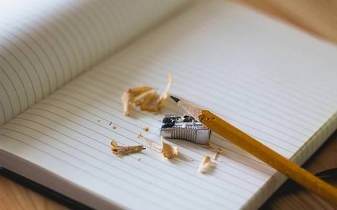 pencil and sharpener on a notebook
