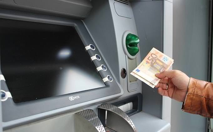 withdrawing money from ATM