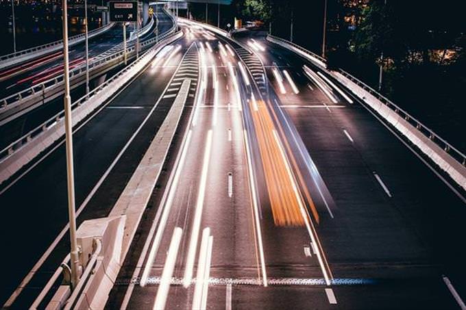 freeway with lots of cars going fast