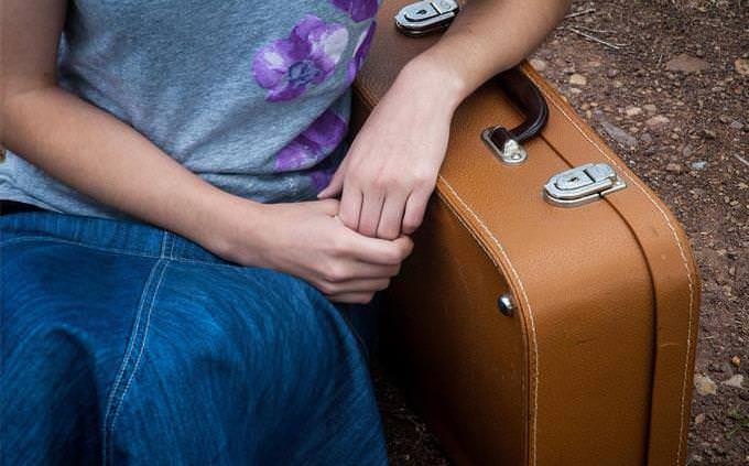 woman and suitcase