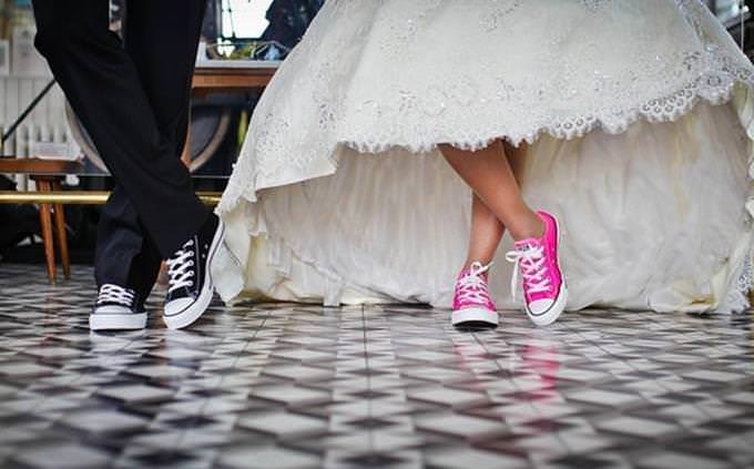 Bride and groom in sneakers