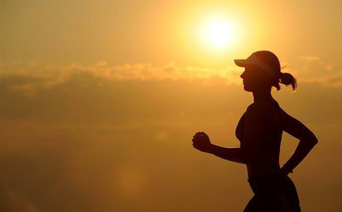 Silhouette of a woman running