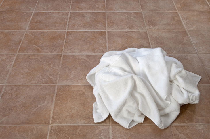 Common Floor & Carpet Cleaning Mistakes wet towel on the floor