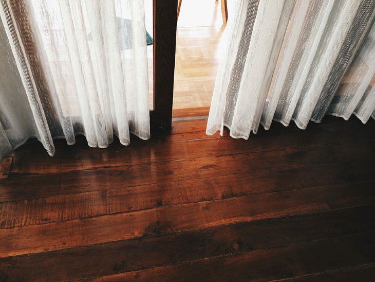 Common Floor & Carpet Cleaning Mistakes curtains and hardwood floors