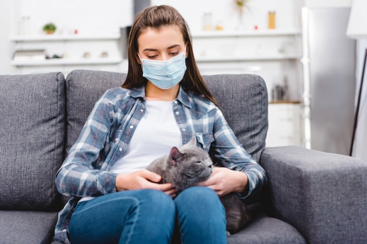 5 Surprising Ways to Lower Your Covid-19 Infection Risk girl with mask at home