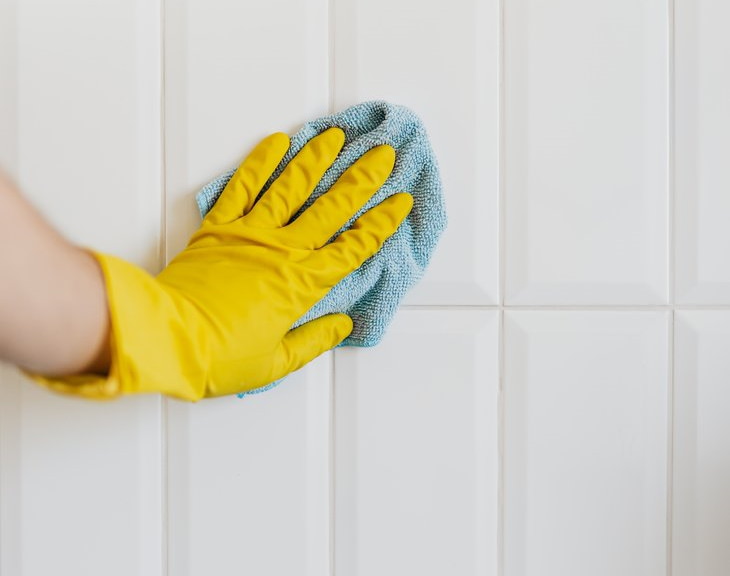 Simple Home Upgrades cleaning bathroom tiles