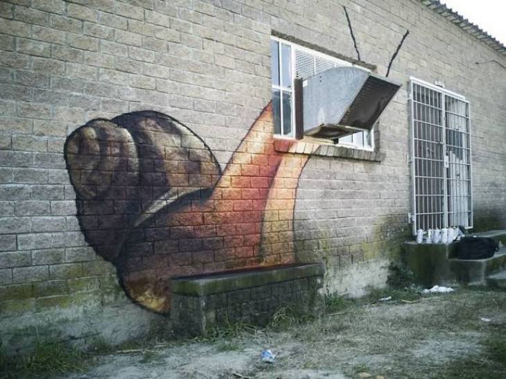 Graffiti Artist Uses Surroundings Brilliantly