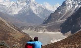 couple sitting with mountain view