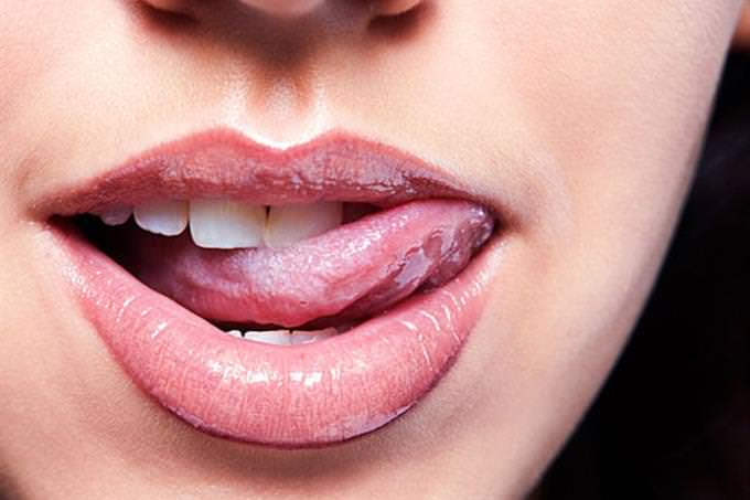 female licking lips