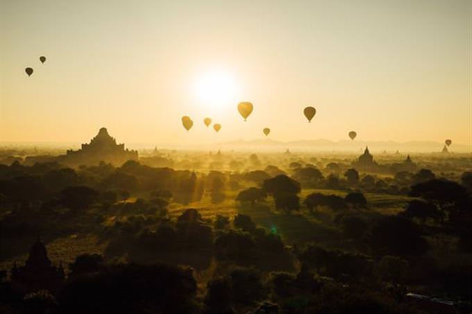 hot air balloons at sunset