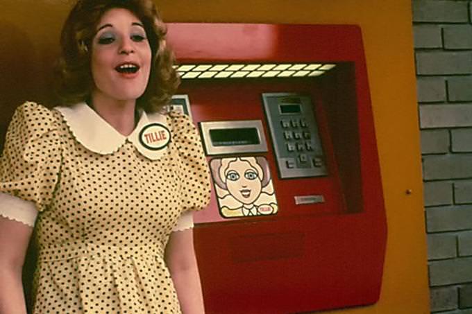 vintage woman in front of ATM