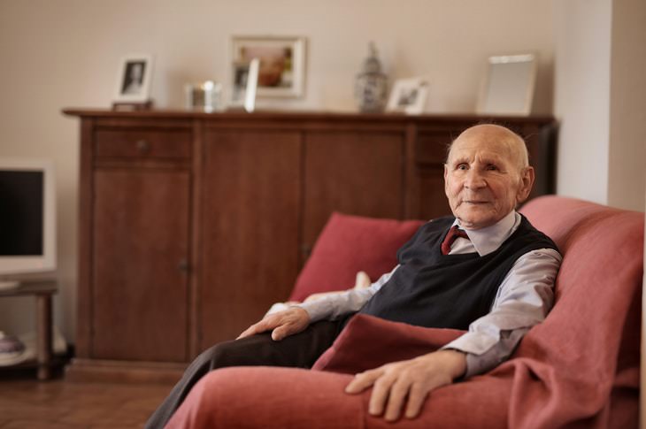 Vaccines and Alzheimer's Disease old man sitting in couch