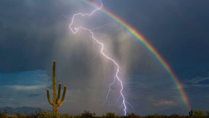 Nature Photos A rainbow and lightning side by side in Arizona