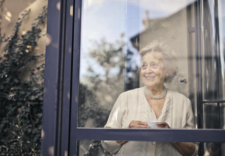 Hearing Loss Commorbidities elderly woman behind the glass