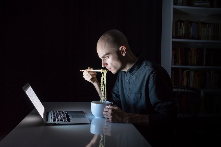 Eat Your Dinner Early, man eating noodles at night