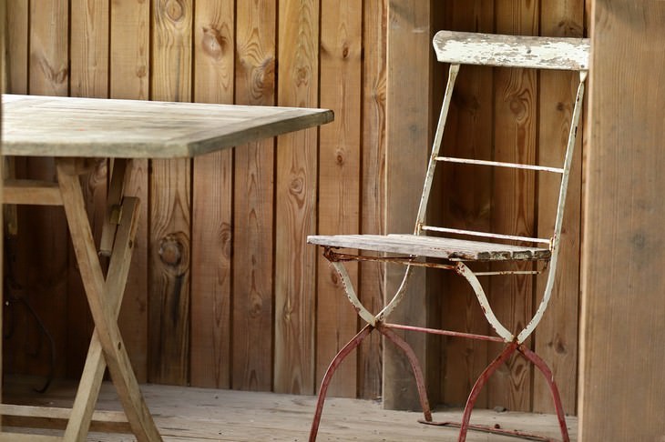 12 Things That Should Never Be Stored in the Attic wood furniture