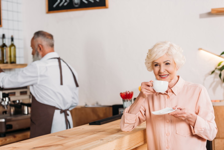 Coffee Facts elderly man making coffee, elderly woman drinking coffee