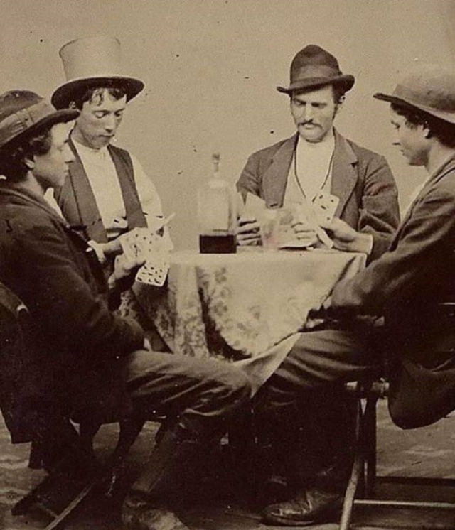 Vintage Photos Billy the Kid (the 2nd person to the left) playing cards (1877)