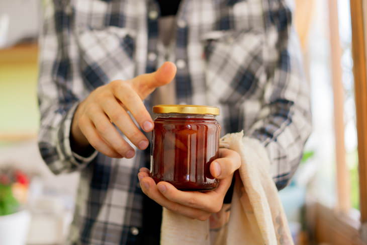 How to Open a Stuck Jar Lid opening jar with towel