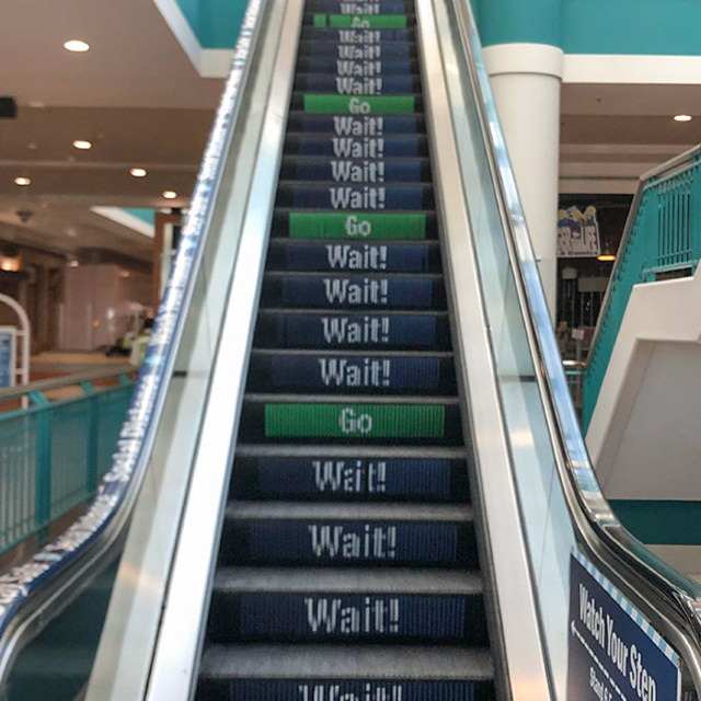 Creative Solutions escalator with social distancing markers