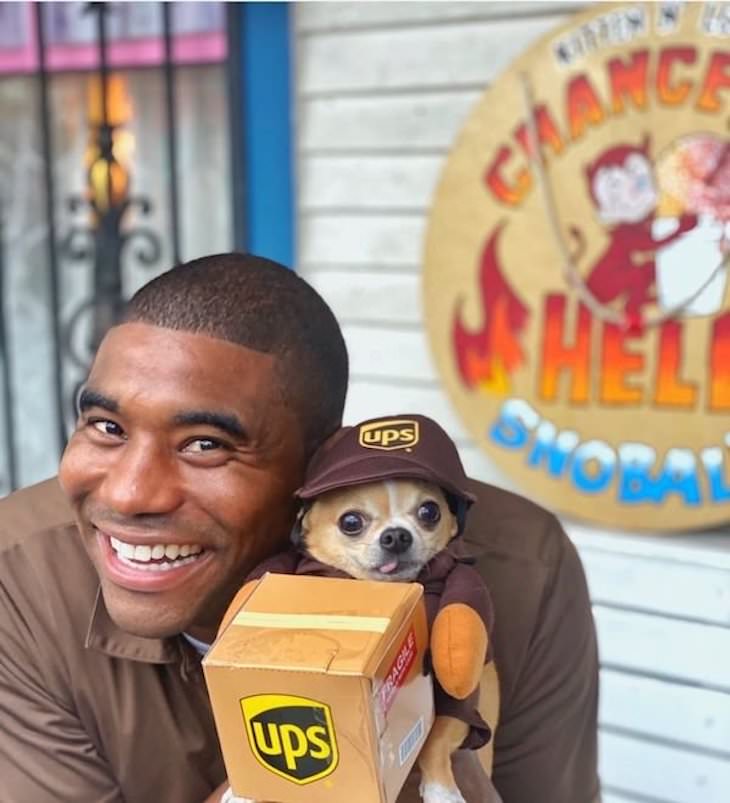 UPS Driver Documents Every Cute Pet He Meets dog in ups uniform