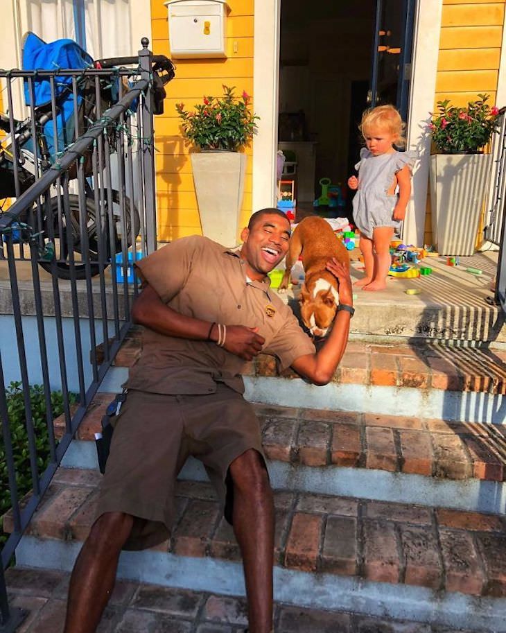 UPS Driver Documents Every Cute Pet He Meets dog and kid on the patio