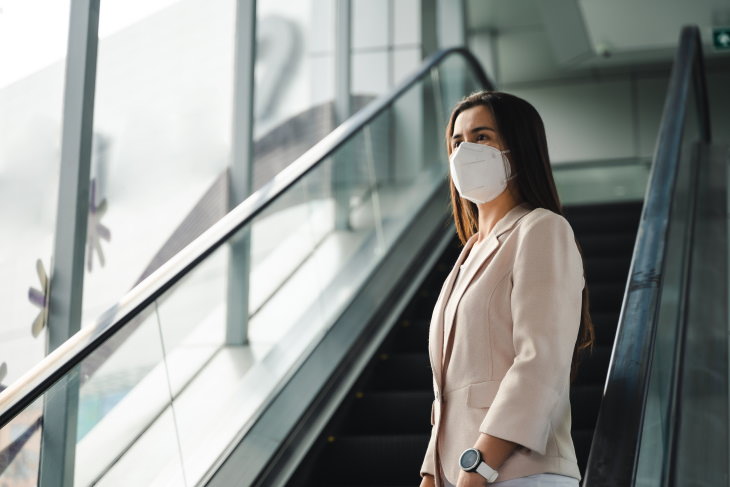 Doubling-Up on Masks woman wearing KN95 mask